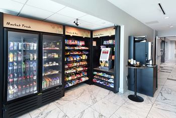 A market fresh section in a store with a variety of products at Two Twelve Clayton Apartments, Clayton
